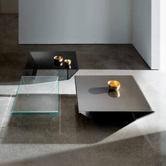 Elegant Sovet Italia Rubino coffee table in bent smoked glass with a glossy grey toned square top and angular supports