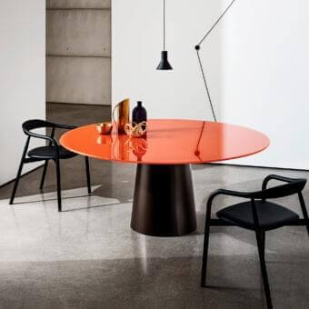 Superior Sovet Italia Totem table with vibrant orange tempered glass tabletop and sleek black lacquered metal base