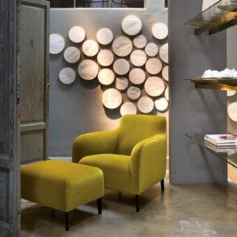 Exceptional Verzelloni Divanitas lounge chair with vibrant yellow textured textile upholstery and burnished cast aluminum legs