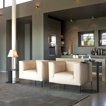 Distinguished Verzelloni Fold lounge chair with light beige textile upholstery and dark matte metal legs
