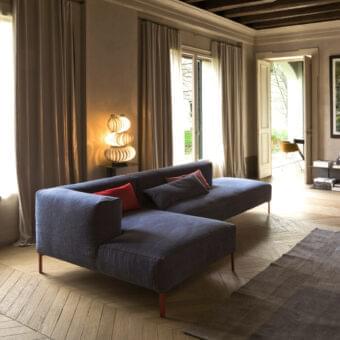 Exceptional Verzelloni Fold sectional with deep blue woven fabric upholstery and reddish-brown cushions, built with a solid wood frame