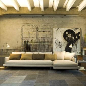 Exceptional Verzelloni Larsen sectional upholstered in neutral beige woven fabric with dark metal feet