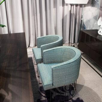 Exceptional Erba Candy armchair with complex blue and greenish-blue weave upholstery and bright chrome metal base