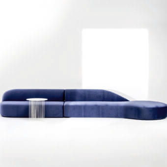 Lavish LaCividina Guest sectional with countless landscapes upholstered in deep blue plush fabric and a curved silhouette