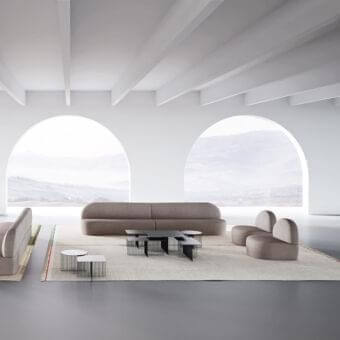 Sophisticated LaCividina Guest sofa with low curved silhouette and smooth warm beige-grey textile upholstery