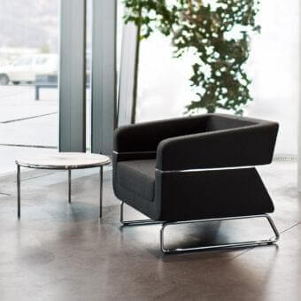 Superior LaCividina Matrix lounge chair with dark gray woven fabric upholstery and chrome-plated metal sled base