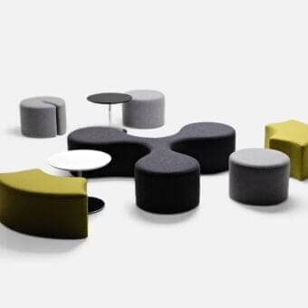 Distinctive LaCividina Molecule ottoman with trefoil structure upholstered in muted yellow-green textile and wooden frame