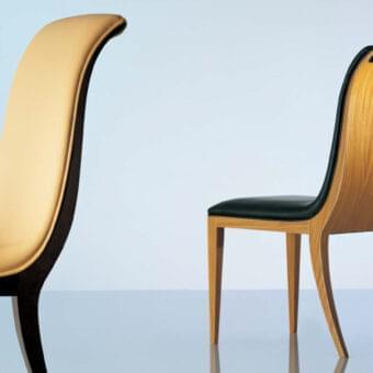 Elegant OAK Cleopatra chair with curved backrest and dark leather detail in Rosewood finish