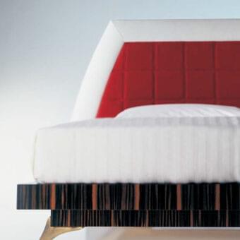 Distinguished OAK Zahira bed with padded red leather headboard and Rosewood striped frame built with angled metal legs