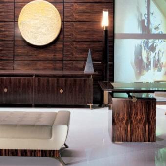 Exceptional OAK Kronos desk crafted with ebony and crystal glass, presenting bronzed brass details and a glossy wood grain surface