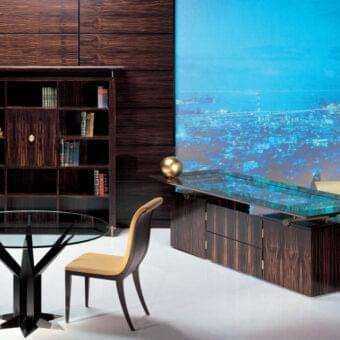Elegant OAK Kronos desk with crystal glass top, ebony wood base and bronzed brass or satined nickel details exhibiting a glossy finish
