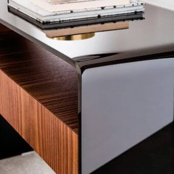 Elegant Sovet Italia Bridge drawer console built in bent glass with reflective black finish and medium brown wood accents