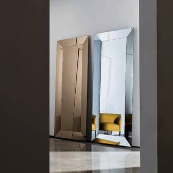 Exceptional Sovet Italia Denver mirror with edge-to-edge glass surfaces and a beveled glass frame reflecting a bronze hue