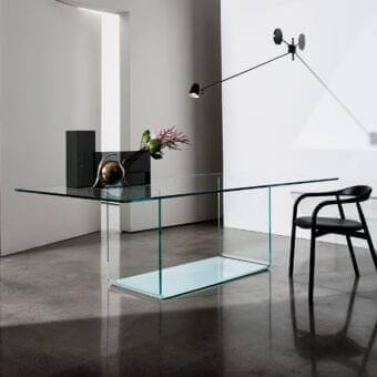 Exceptional Sovet Italia Valencia table with extra-light bent glass base and transparent glass tabletop with lacquered finish