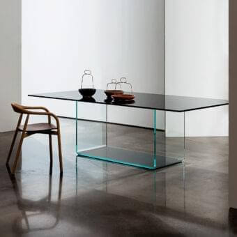 Sophisticated Sovet Italia Valencia table crafted with extra-light bent glass and tempered glass in a dark smoky gray-black finish