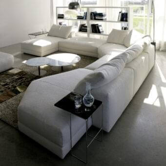 Exceptional Swan Italia Hills sectional with white removable fabric and generous feather filled cushions