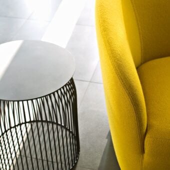 Exceptional LaCividina Dep sofa with yellow textured fabric upholstery and light matte side table built with dark metal