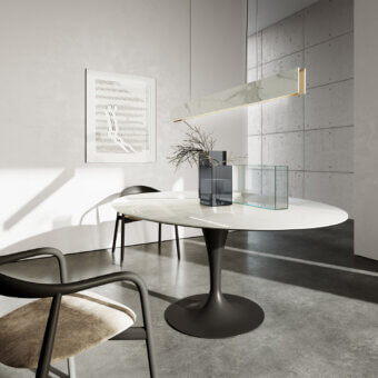 Elegant Sovet Italia Flute elliptical table with light stone composite top and dark gray lacquered metal tulip base