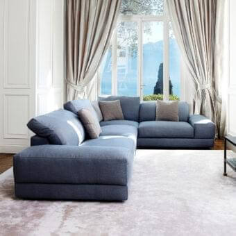 Superior Swan Italia Hamlet sectional with muted blue textile upholstery and beech-wood feet with black painted finish
