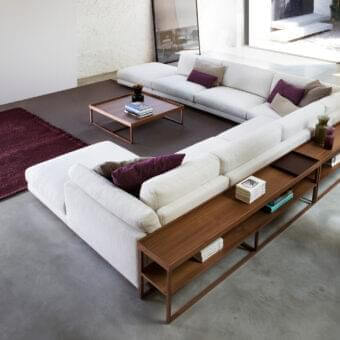Distinguished Swan Italia Match sofa, a sectional with Canaletto walnut frame and light neutral woven upholstery, built with a connected console system
