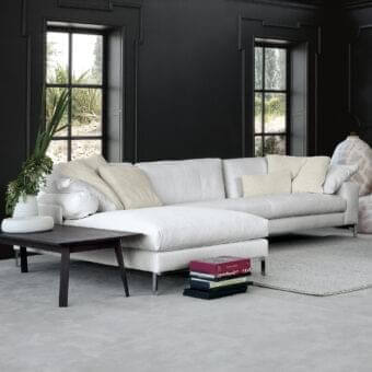 Lavish Swan Italia Molvedo sectional with light-toned textile upholstery and a powder-coated brown-bronze metal base