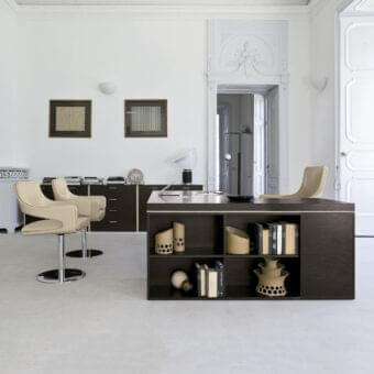 Superior 4 Mariani Blade desk crafted with wood and saddle leather in a dark finish with light accenting