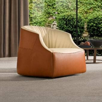 Exceptional 4 Mariani Blob lounge chair with warm brown leather upholstery, creamy beige interior, and black ABS feet