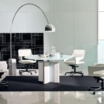 Distinguished 4 Mariani De-Symetria table with extra-clear tempered glass and light-toned varnished glass base crafted in leather detailing