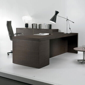 Distinguished 4 Mariani Blade desk with dark brown wood, saddle leather accents and a matte finish