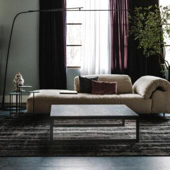 Elegant Cattelan Italia Kitano coffee table with ceramic top and matte black painted steel base