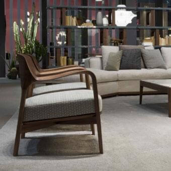 Exceptional Porada Louis lounge chair with Canaletto walnut frame and patterned cool gray cushion in matte finish