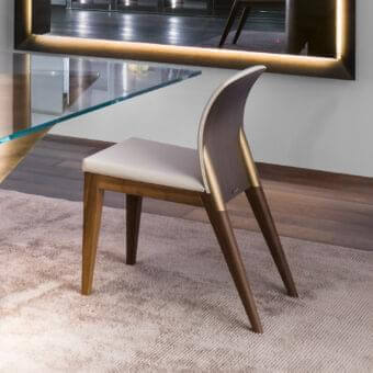 Elegant Reflex Sit modular chair with curved aluminum back in gold finish and nero beluga matt lacquered wood legs upholstered in light textile