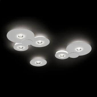 Elegant Lodes Bugia ceiling lamp with overlapping white disc forms crafted in Italy and matte finish