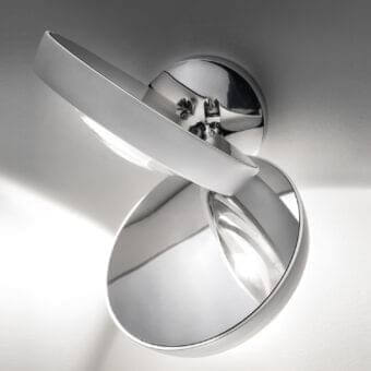 Elegant Lodes Nautilus wall lamp with reflective metal discs connected by a central mounting point, exhibiting a glossy finish
