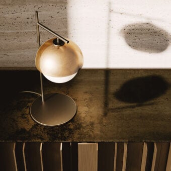 Exceptional VENICEM Urban table lamp with burnished brass, a matt gold perforated metal mesh lampshade, and refined white Murano glass diffuser