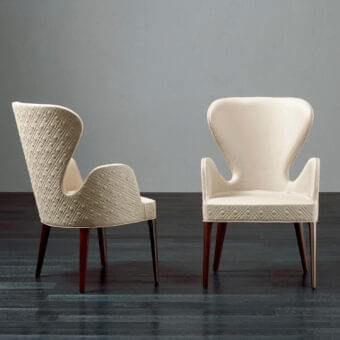 Elegant Rugiano Aida armchair with textured light beige fabric and satin-finish dark wood frame