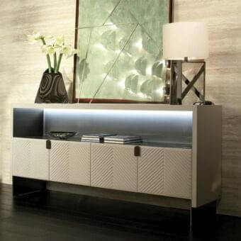 Exceptional Rugiano Iolanda sideboard with smooth leather upholstery, dark gray top, and integrated lighting within a glass back