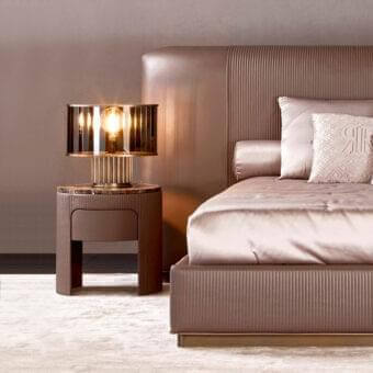 Elegant Rugiano Vogue nightstand with rose-brown wood frame and round marble top in satin finish