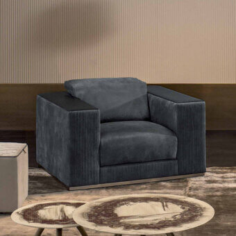 Exceptional Rugiano Vogue lounge chair with dark gray velvety textile and sleek metal base crafted with ribbed detailing