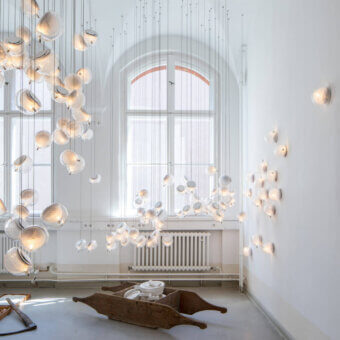 Exceptional Bocci 76 Single Suspension Lamp with hot white and clear glass plus delicate copper mesh detailing