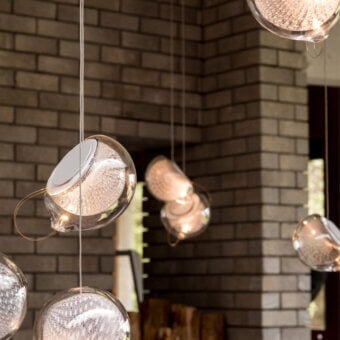 Distinguished Bocci 76 Single Suspension Lamp crafted in hot white and clear glass with copper mesh detailing and a silvery-grey finish