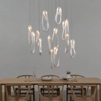 Luxury Bocci 87 Random suspension lamp crafted in pale gray glass with satin metal rods and gentle illumination