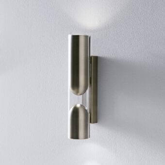 Sophisticated Penta Clash wall lamp uniting transparent glass with brushed bronze crafted for ambient illumination