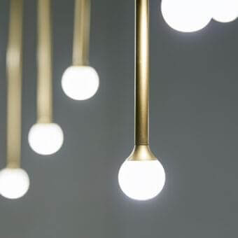 Superior Penta Storm suspension lamp with illuminated spherical diffusers and brushed gold varnished metal stem