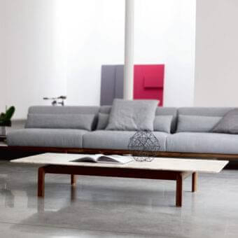Distinguished Porada Quay coffee table with a Marble top and recessed solid Canaletto walnut wood frame in satin finish
