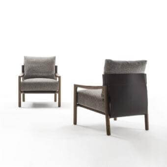 Sophisticated Porada Vera lounge chair with Canaletto walnut frame and Cuoietto leather back in gray textured fabric