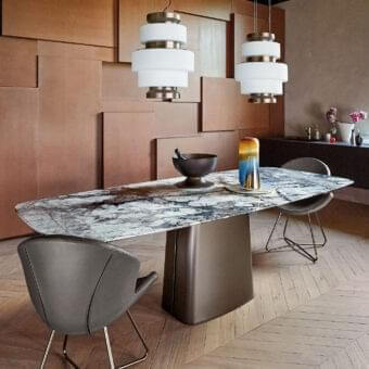 Distinguished Arketipo Icon table with shaped Slate Grey marble top and micaceous brown varnished metal pedestal