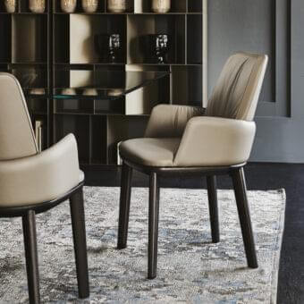 Sophisticated Cattelan Italia Belinda chair with gently curved form in beige synthetic leather and dark satin-finished stained ash wood