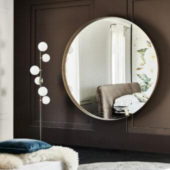 Superior Cattelan Italia Wish Magnum mirror with polished titanium-finished steel and a glossy reflective surface