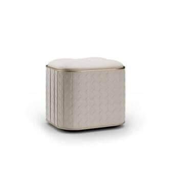 Distinguished Reflex San Marco ottoman crafted in textured woven fabric with brass satin band and quiltings